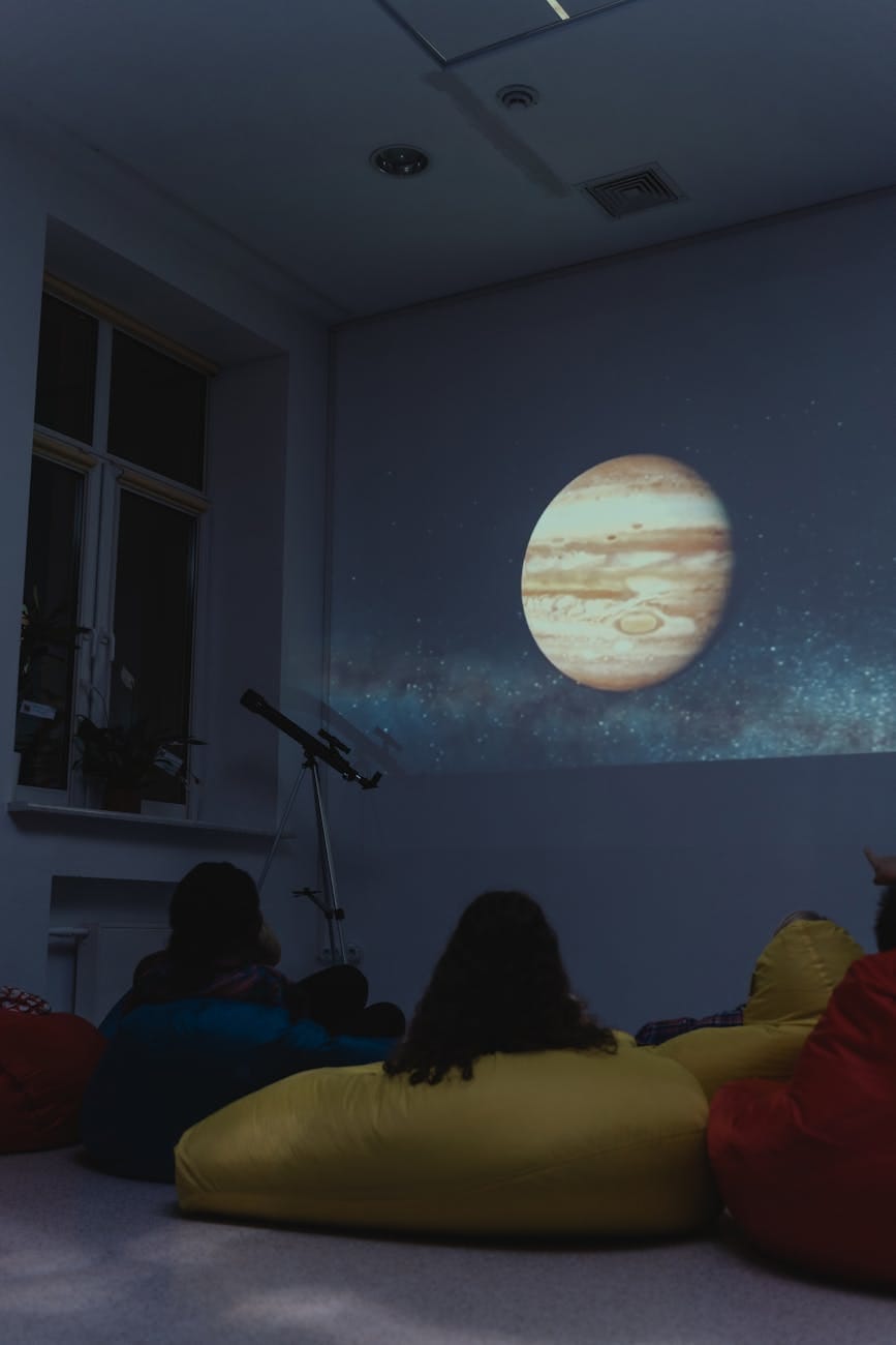 children watching astronomy projection